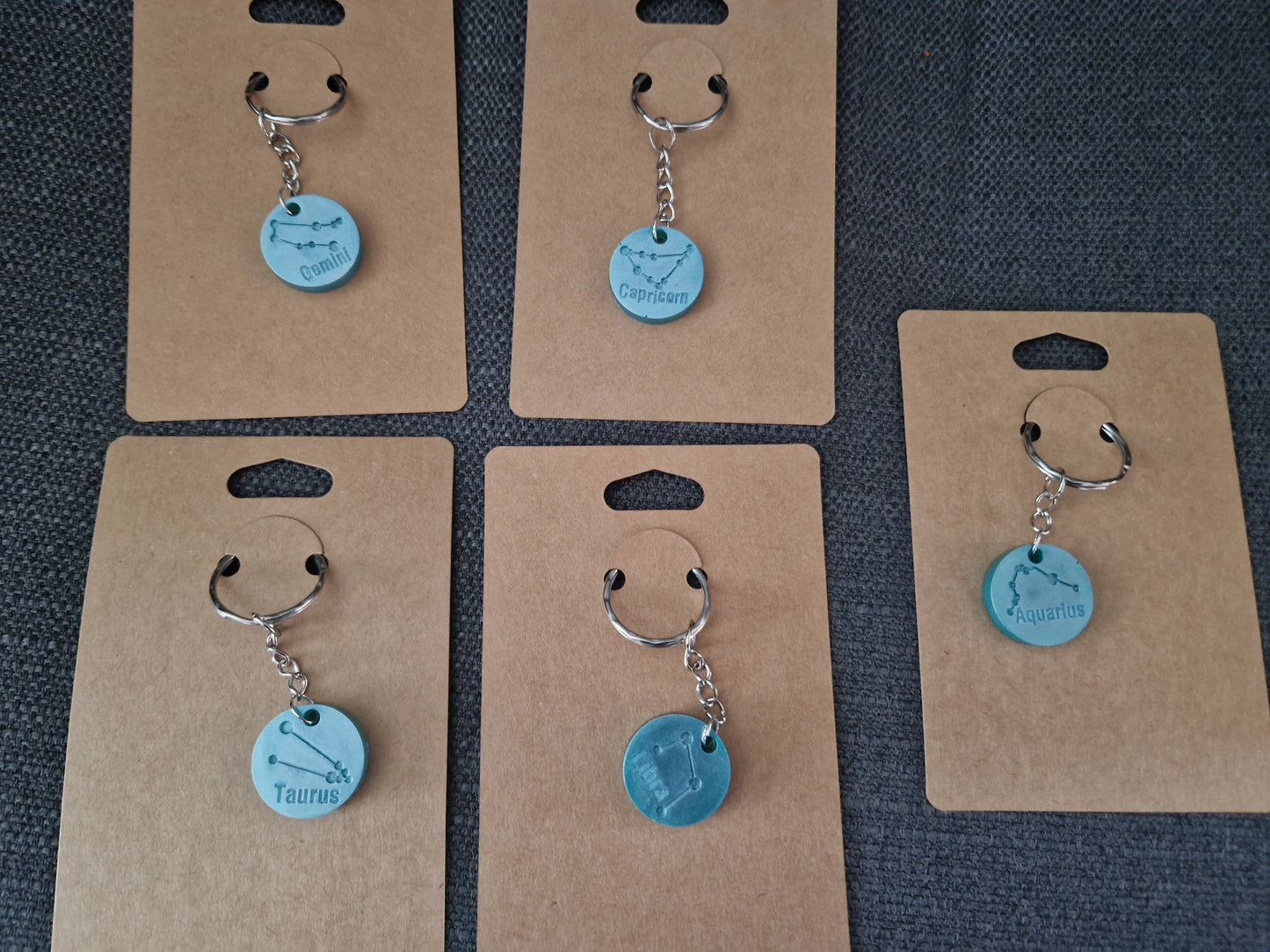 Start sign key rings